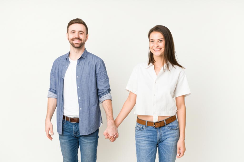 happy couple holding hands confidently