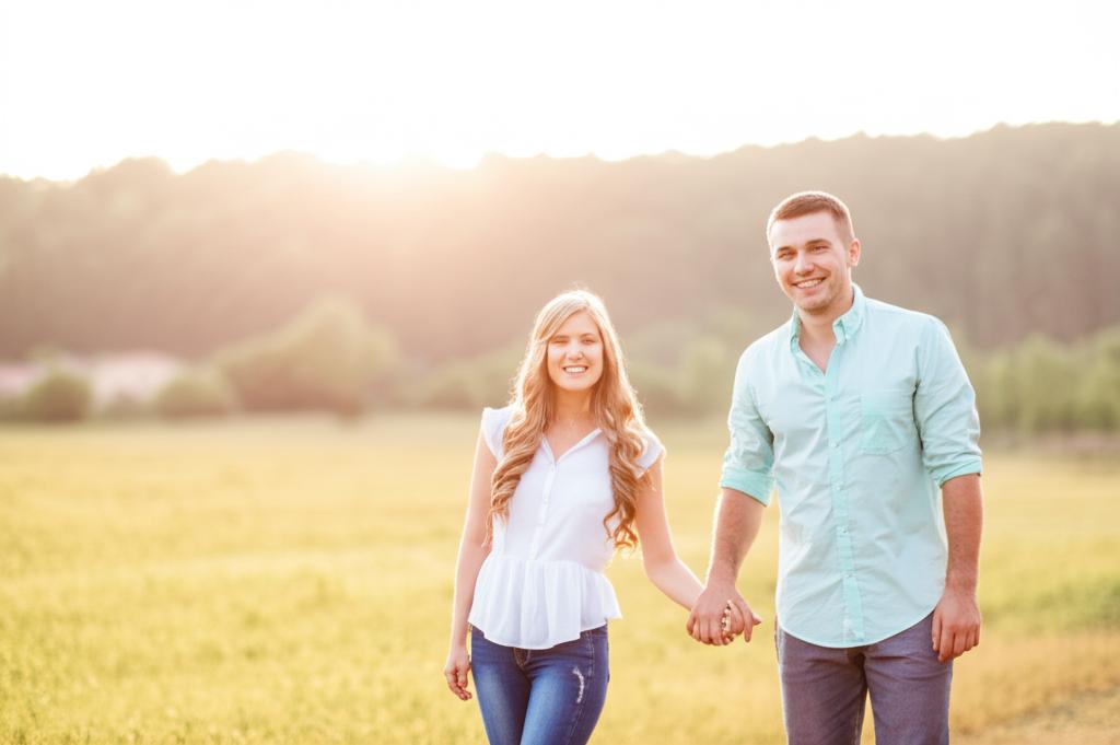Happy couple holding hands